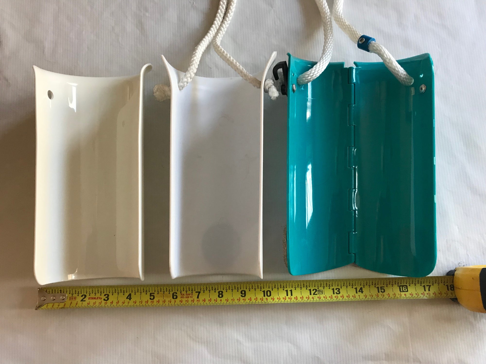 FOLDING PLASTIC COMPRESSION SOCK AID WITH DOUBLE SPRING ASSIST.  CREATIVE SELF CARE SOLUTIONS Folding hard sock aid helps open the sock.